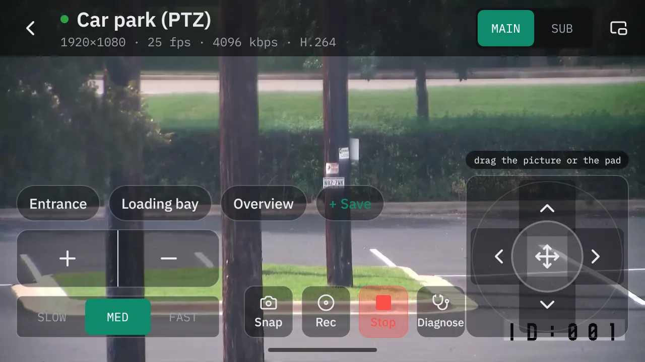 Live view on an Android phone held sideways: the picture fills the screen with the saved positions, speed, zoom and pan-tilt pad drawn over it.